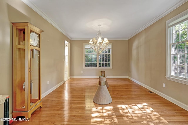 26 Bruns Rd, Allenhurst, NJ 07711 - unfurnished dining area with a chandelier, light wood-style flooring, and ornamental molding
