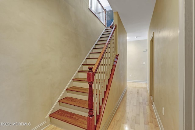 26 Bruns Rd, Allenhurst, NJ 07711 - stairs featuring wood finished floors and baseboards