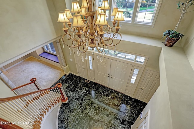 26 Bruns Rd, Allenhurst, NJ 07711 - foyer entrance featuring a chandelier and marble finish flooring