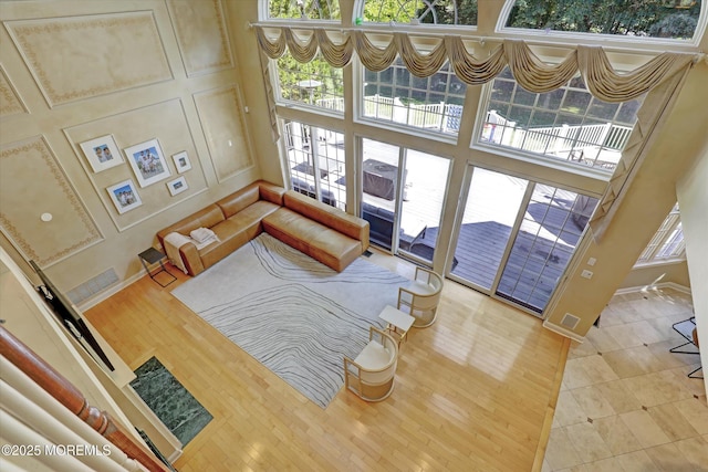 26 Bruns Rd, Allenhurst, NJ 07711 - living area with a high ceiling and wood finished floors