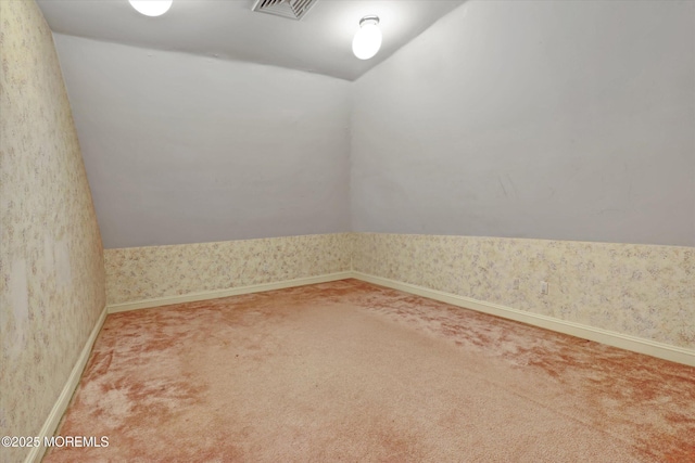 26 Bruns Rd, Allenhurst, NJ 07711 - carpeted empty room featuring vaulted ceiling and wallpapered walls