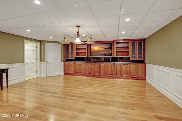 26 Bruns Rd, Allenhurst, NJ 07711 - bar area featuring wainscoting, light wood-style flooring, recessed lighting, a decorative wall, and decorative light fixtures