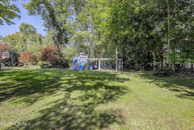 26 Bruns Rd, Allenhurst, NJ 07711 - view of green lawn with a playground