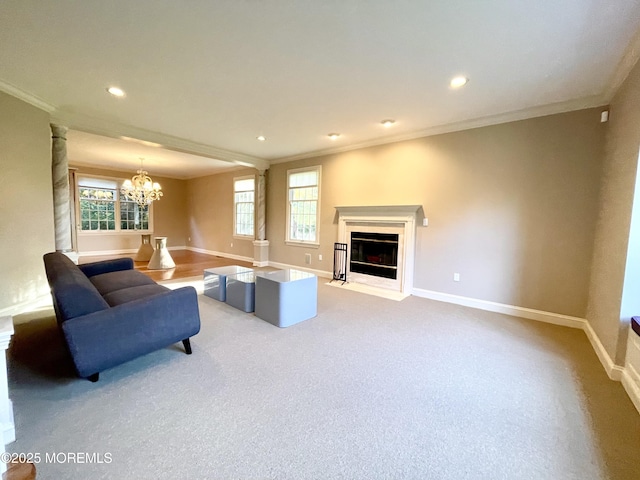 26 Bruns Rd, Allenhurst, NJ 07711 - living room with crown molding, a chandelier, a fireplace with flush hearth, recessed lighting, and light carpet