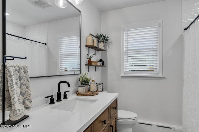 17 Rose St, Lincroft, NJ 07738 - full bath featuring a baseboard heating unit, vanity, and a shower with shower curtain