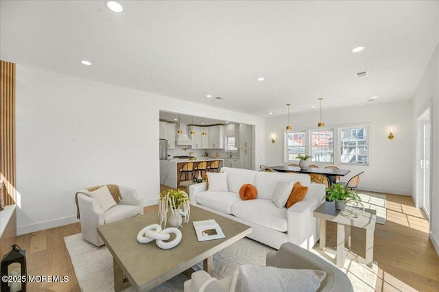 5 Shore Pine Dr, Brick, NJ 08723 - living room featuring light wood-style floors and recessed lighting
