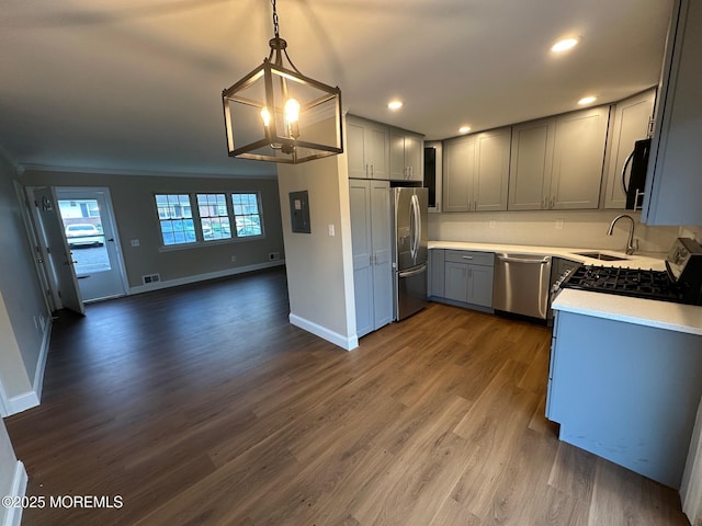 8 Missouri Ct, Matawan, NJ 07747 - kitchen featuring stainless steel appliances, gray cabinets, a chandelier, open floor plan, and light countertops