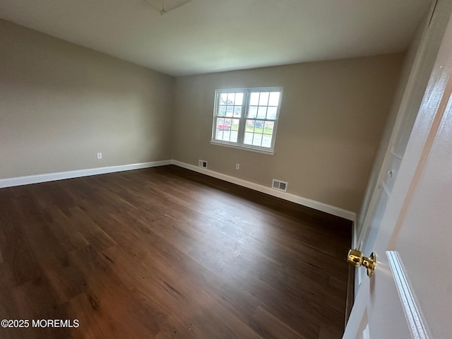 8 Missouri Ct, Matawan, NJ 07747 - spare room with dark wood finished floors