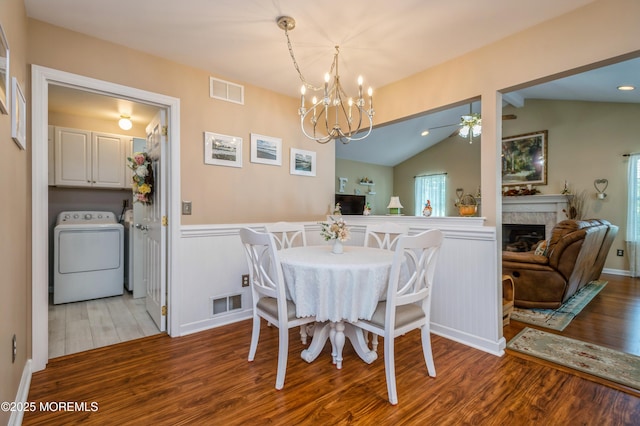 12 Aarons Way, Brick, NJ 08723 - dining area with washer / clothes dryer, wood finished floors, wainscoting, vaulted ceiling, and ceiling fan