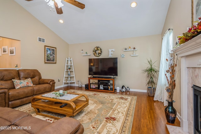 12 Aarons Way, Brick, NJ 08723 - living area featuring ceiling fan, a premium fireplace, wood finished floors, recessed lighting, and high vaulted ceiling
