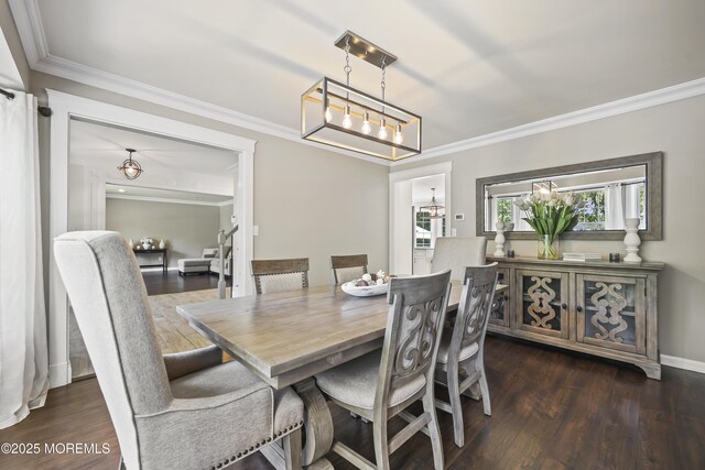 304 Mackenzie Dr, Jackson, NJ 08527 - dining room with ornamental molding, wood finished floors, and a chandelier