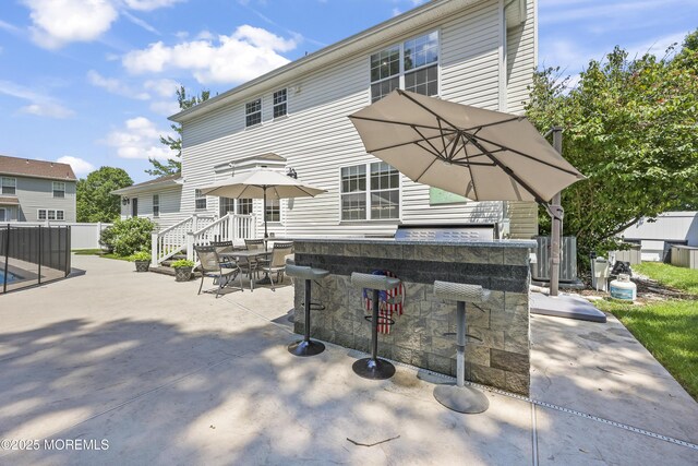 304 Mackenzie Dr, Jackson, NJ 08527 - rear view of property with a patio area