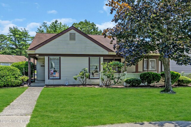 853 Winchester Ct Unit A, Manchester, NJ 08759 - view of front of property featuring a front yard and roof with shingles
