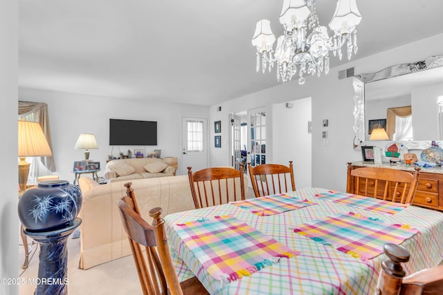 853 Winchester Ct Unit A, Manchester, NJ 08759 - dining area with a chandelier and light colored carpet