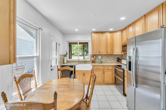 853 Winchester Ct Unit A, Manchester, NJ 08759 - kitchen featuring appliances with stainless steel finishes, decorative backsplash, light tile patterned floors, recessed lighting, and light brown cabinets