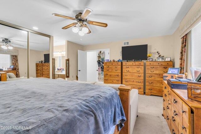 853 Winchester Ct Unit A, Manchester, NJ 08759 - bedroom with light colored carpet, multiple windows, a closet, and ceiling fan