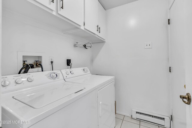 853 Winchester Ct Unit A, Manchester, NJ 08759 - laundry area featuring a baseboard heating unit, cabinet space, washer and dryer, and light tile patterned floors