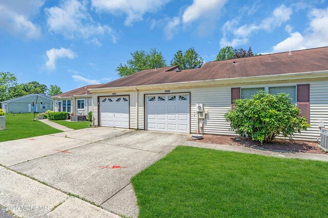 853 Winchester Ct Unit A, Manchester, NJ 08759 - single story home featuring driveway, a garage, a front lawn, and roof with shingles