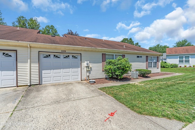 853 Winchester Ct Unit A, Manchester, NJ 08759 - ranch-style house featuring concrete driveway, an attached garage, and a front yard