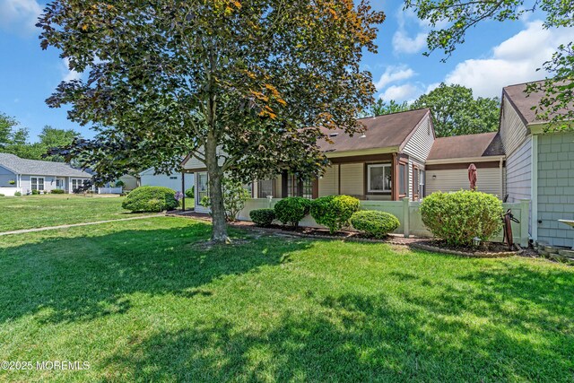 853 Winchester Ct Unit A, Manchester, NJ 08759 - view of front facade with a front lawn and roof with shingles