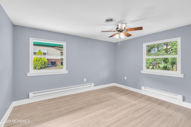 14A Portsmouth St, Whiting, NJ 08759 - spare room with a baseboard heating unit, healthy amount of natural light, and ceiling fan