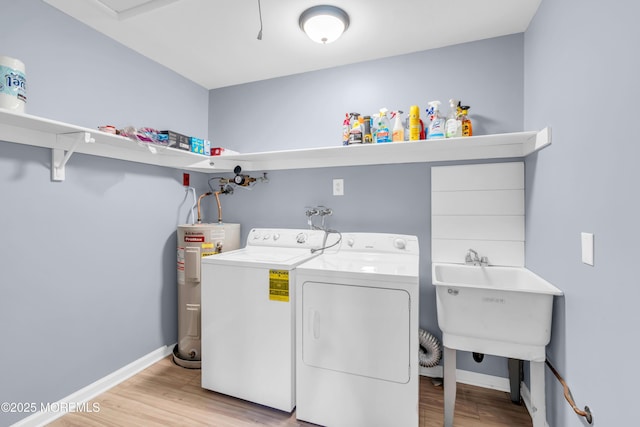 14A Portsmouth St, Whiting, NJ 08759 - laundry room with independent washer and dryer, water heater, and light wood-style flooring