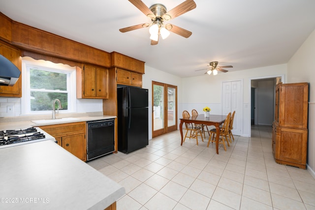 35 Fairview Dr, Middletown, NJ 07748 - kitchen featuring black appliances, light countertops, brown cabinets, and a ceiling fan