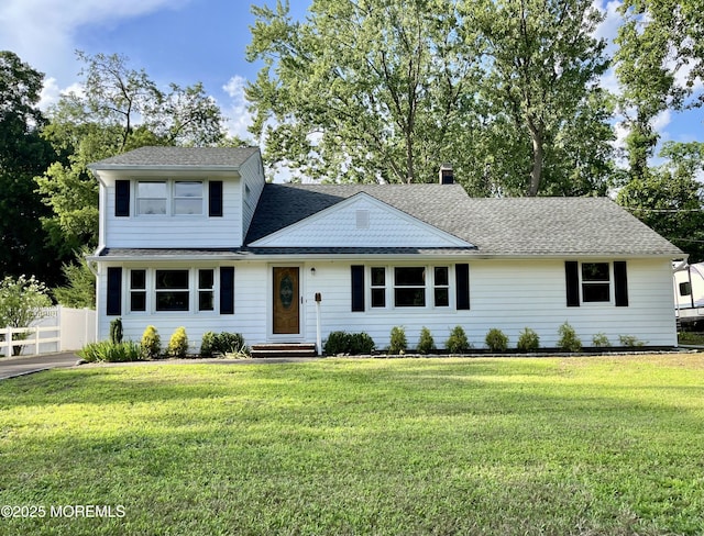 35 Fairview Dr, Middletown, NJ 07748 - view of front of property featuring roof with shingles, a chimney, and entry steps