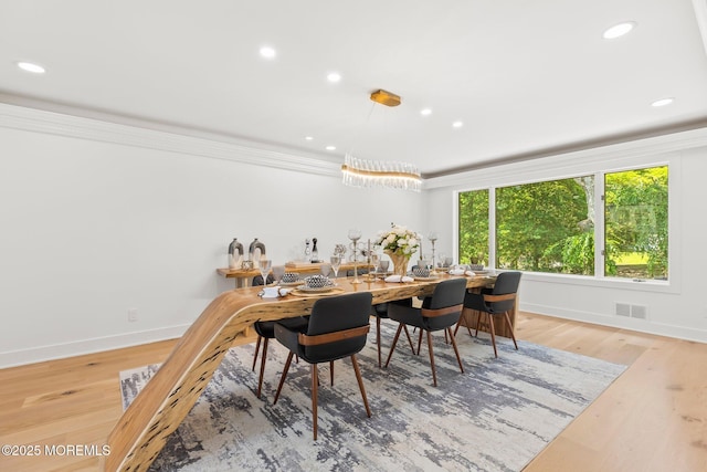 1218 W Park Ave, Ocean Twp, NJ 07712 - dining area featuring recessed lighting, wood finished floors, and crown molding