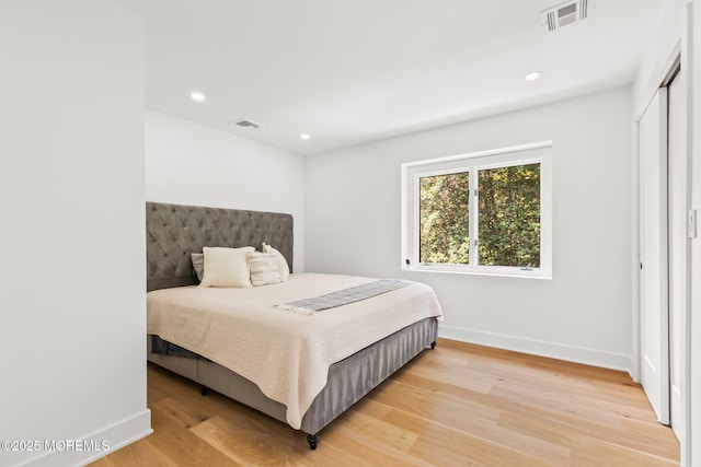 1218 W Park Ave, Ocean Twp, NJ 07712 - bedroom with light wood-type flooring and recessed lighting