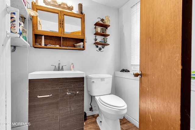 886 Stafford Dr, Toms River, NJ 08753 - half bath featuring vanity and wood finished floors