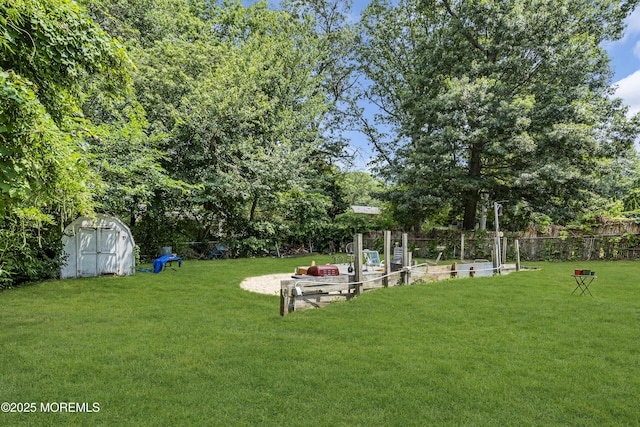 886 Stafford Dr, Toms River, NJ 08753 - view of yard featuring a shed and view of scattered trees