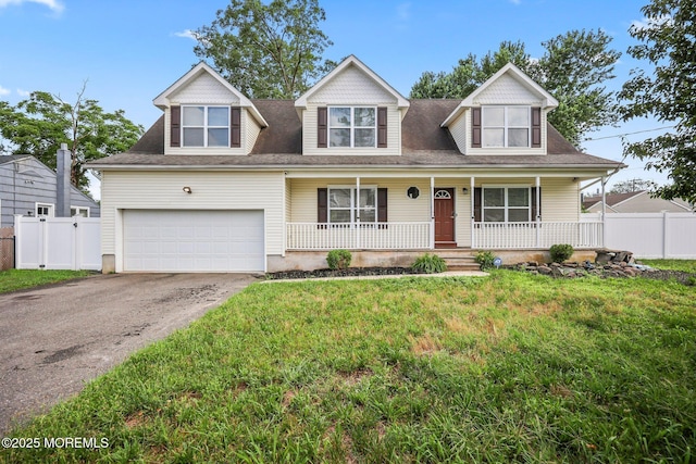 18 4th Ave, Toms River, NJ 08757 - view of front of house featuring asphalt driveway, covered porch, and a shingled roof