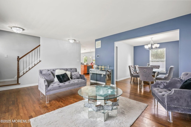 18 4th Ave, Toms River, NJ 08757 - living room featuring stairs, a chandelier, and wood finished floors