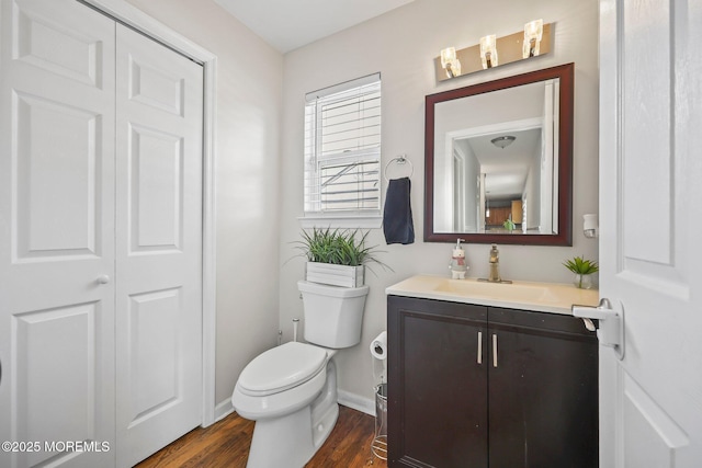 18 4th Ave, Toms River, NJ 08757 - bathroom featuring vanity, wood finished floors, and a closet