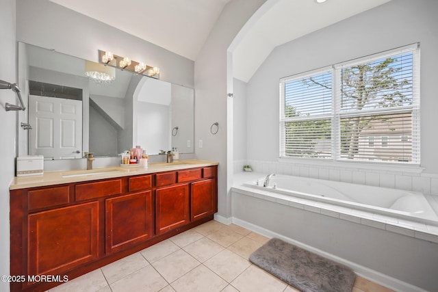 18 4th Ave, Toms River, NJ 08757 - full bathroom featuring double vanity, vaulted ceiling, a garden tub, and tile patterned floors