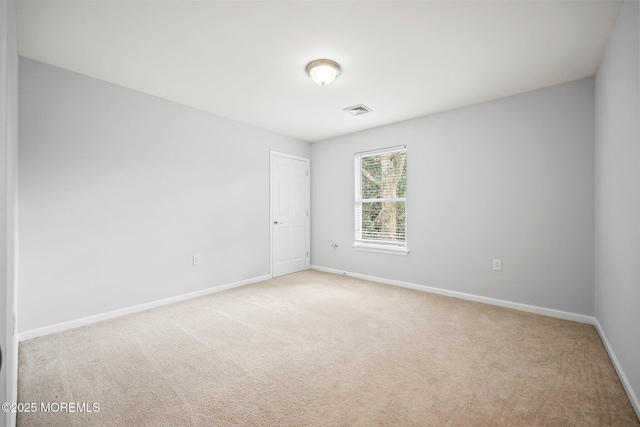 18 4th Ave, Toms River, NJ 08757 - carpeted spare room with baseboards