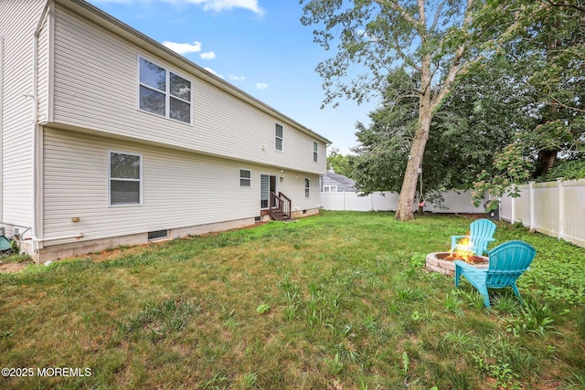 18 4th Ave, Toms River, NJ 08757 - fenced backyard featuring entry steps and a fire pit