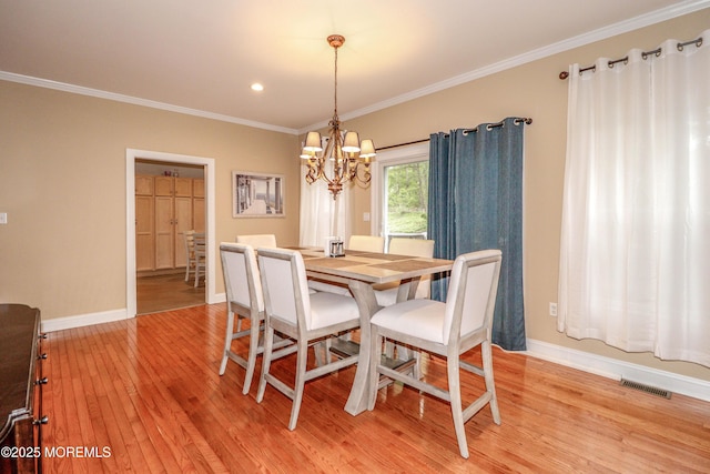 45 Sugar Hill Rd, Manahawkin, NJ 08050 - dining space featuring light wood-type flooring, a chandelier, ornamental molding, and recessed lighting