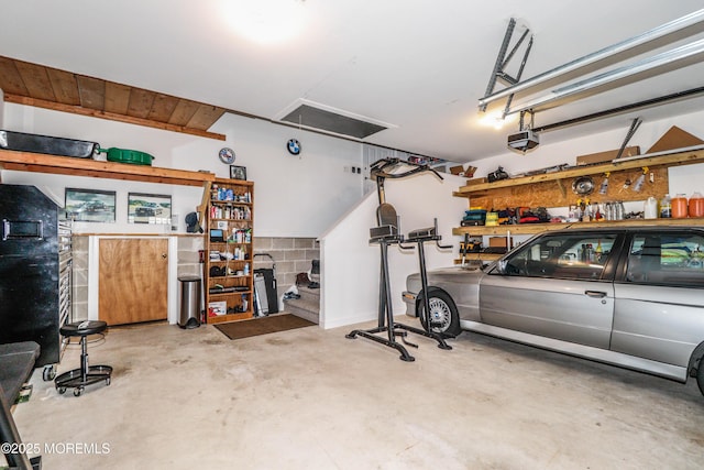 45 Sugar Hill Rd, Manahawkin, NJ 08050 - garage with a garage door opener and a workshop area