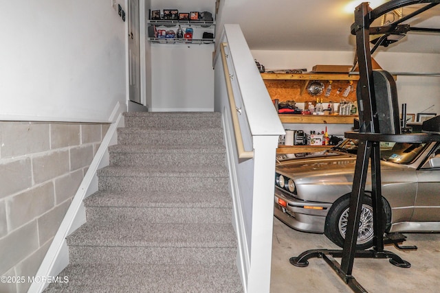 45 Sugar Hill Rd, Manahawkin, NJ 08050 - staircase with concrete block wall and concrete flooring
