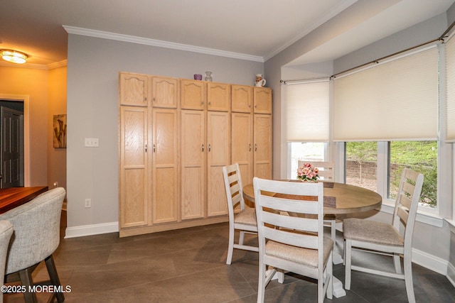 45 Sugar Hill Rd, Manahawkin, NJ 08050 - dining space featuring ornamental molding and dark tile patterned flooring