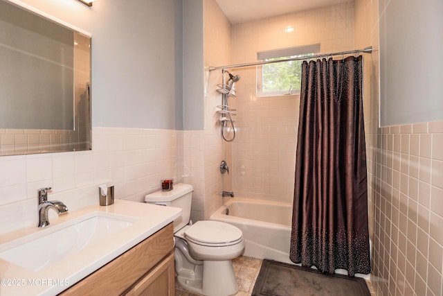 45 Sugar Hill Rd, Manahawkin, NJ 08050 - full bath with tile walls, vanity, shower / bath combo with shower curtain, and wainscoting