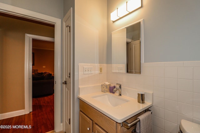 45 Sugar Hill Rd, Manahawkin, NJ 08050 - half bath featuring vanity, wood finished floors, and tile walls