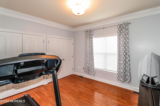 45 Sugar Hill Rd, Manahawkin, NJ 08050 - exercise room with wood-type flooring and ornamental molding