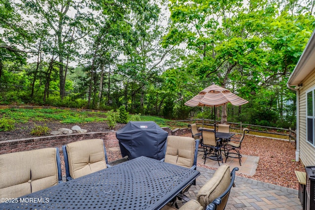 45 Sugar Hill Rd, Manahawkin, NJ 08050 - view of patio with outdoor dining area, a grill, and view of wooded area