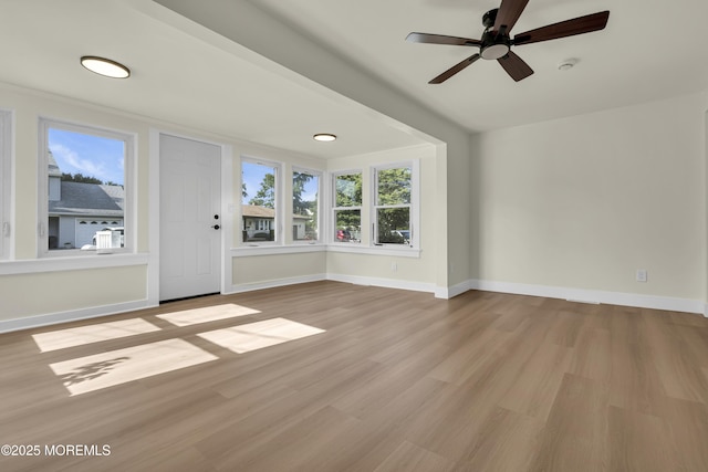 626 Clark Ave, Union Beach, NJ 07735 - unfurnished living room featuring wood finished floors and a ceiling fan