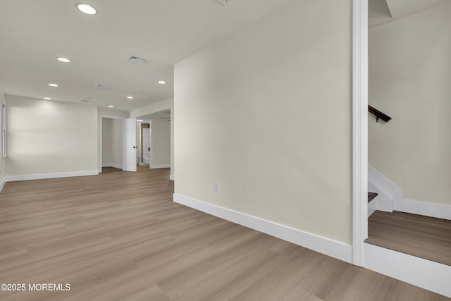 626 Clark Ave, Union Beach, NJ 07735 - spare room with light wood-style flooring, recessed lighting, and stairs