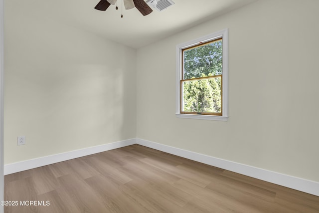 626 Clark Ave, Union Beach, NJ 07735 - spare room featuring wood finished floors and a ceiling fan