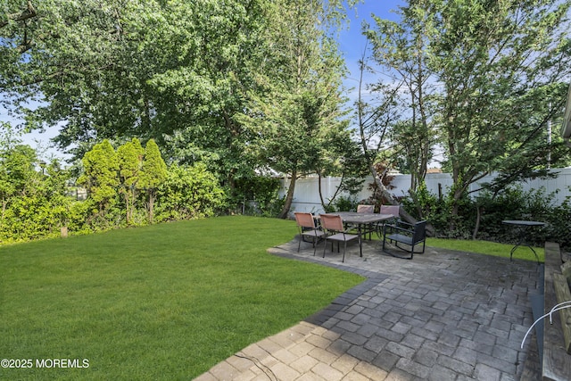 626 Clark Ave, Union Beach, NJ 07735 - fenced backyard with a patio area